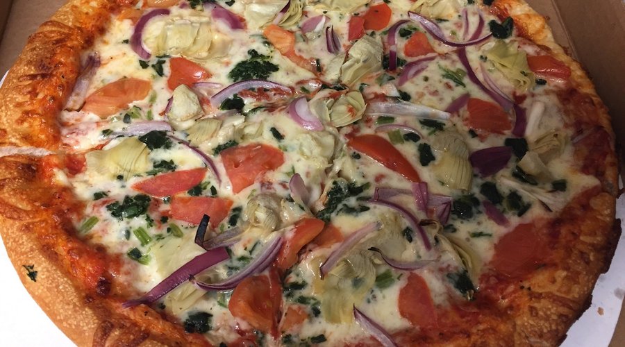 Take out: large pizza with artichokes, spinach, red onion & fresh tomato
