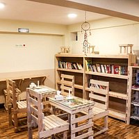 Book shelf at Palpasa Coffee. You can read books from your favorite author.