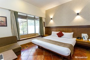 Chandralok Hotel in Lonavala, image may contain: Resort, Hotel, Furniture, Interior Design