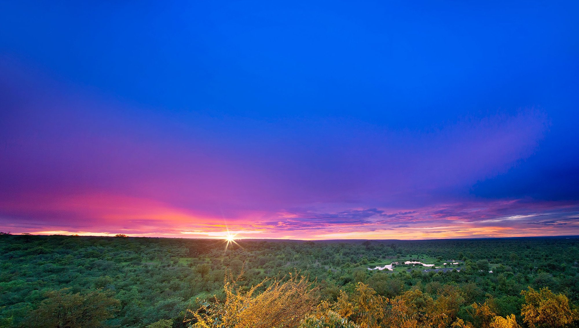 VICTORIA FALLS SAFARI LODGE Updated 2024 Reviews Photos Prices   Sunset From Pool Deck 