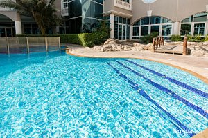 Sharjah Premiere Hotel & Resort in Sharjah, image may contain: Pool, Water, Swimming Pool, Resort