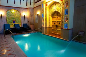 Umaid Mahal-A Heritage Style Boutique Hotel in Jaipur, image may contain: Pool, Water, Chair, Swimming Pool