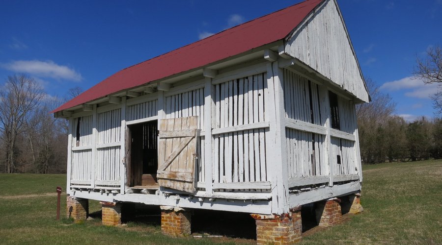 Corn crib on brick pillars to foil rats and mice.