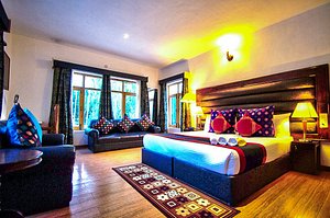 Gomang Boutique Hotel in Leh, image may contain: Couch, Lighting, Home Decor, Interior Design