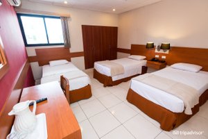Centroamericano Hotel in Panama City, image may contain: Bed, Furniture, Hostel, Housing