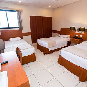 Centroamericano Hotel in Panama City, image may contain: Bed, Furniture, Hostel, Housing