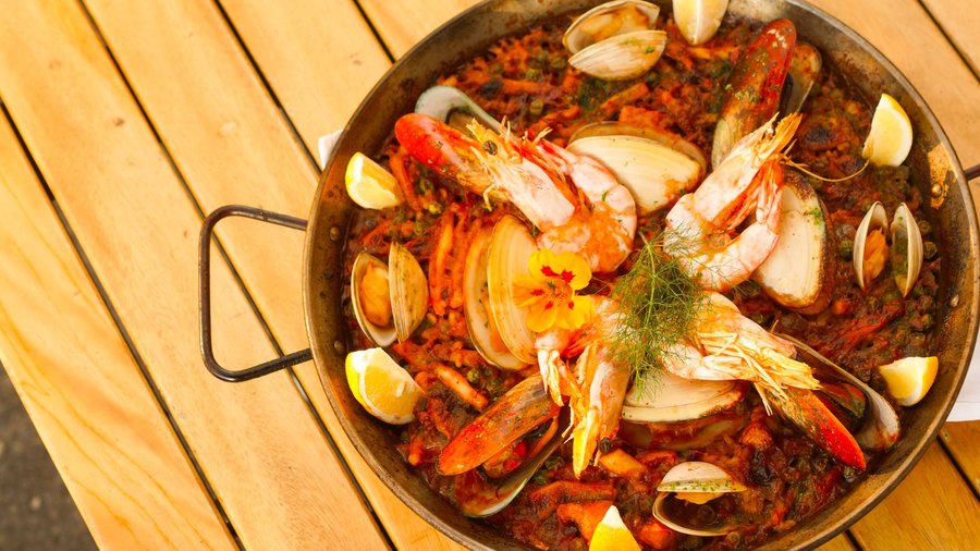 Paella Mixta - the traditional Spanish dish of calasparra rice, seafood & chicken with saffron