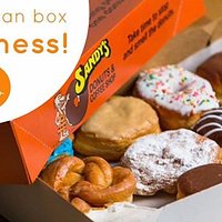 A box of Sandy's Donuts will always put a smile on someones face.