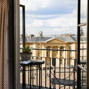 Hotel des Grands Hommes in Paris, image may contain: Bench, Furniture, Interior Design, Bed