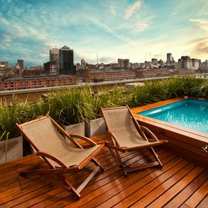 Hotel Madero in Buenos Aires, image may contain: Living Room, Home Decor, Table, Coffee Table