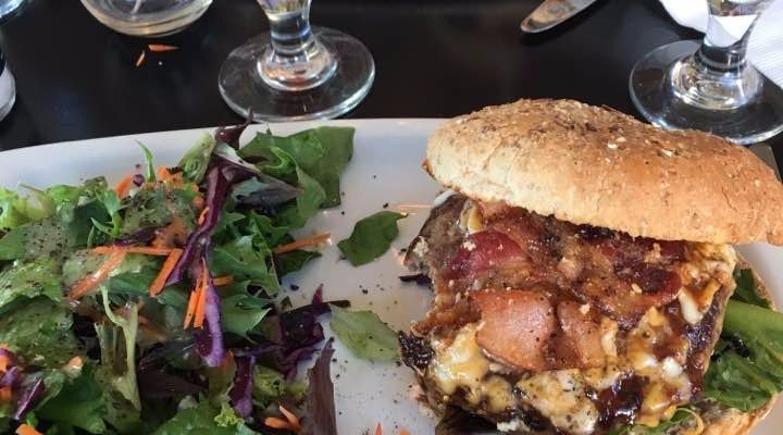 Bacon Cheeseburger with emerald salad and a ceasar of course