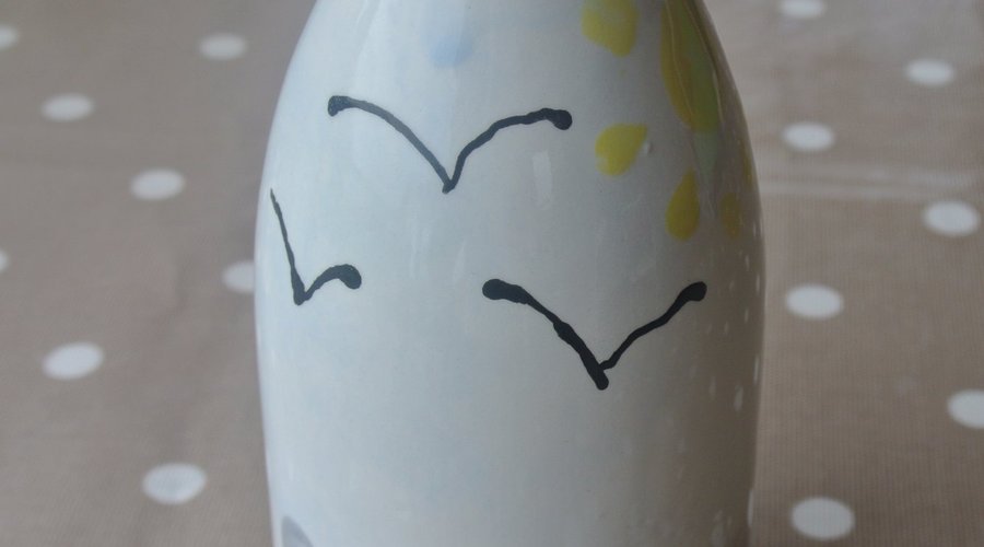 A mossyard milk bottle