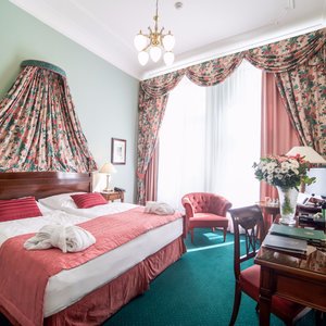 Hotel Liberty in Prague, image may contain: Lamp, Furniture, Table Lamp, Chandelier