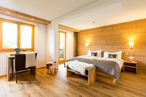 Hotel Bettmerhof in Bettmeralp, image may contain: Interior Design, Indoors, Wood, Hardwood