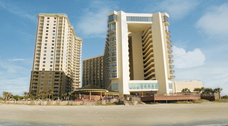View from the Ocean - Hilton is on the right and Royale Palms Condominium Tower is on the left.