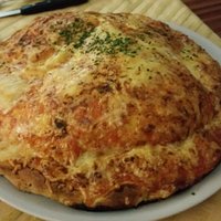 on dirait une calzonne mais le dessus est en fait une sorte de soufflet