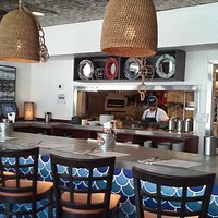 The kitchen off a counter eating area