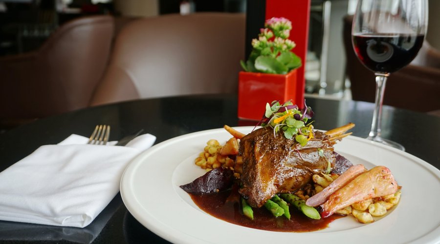 Lamb Osso Buco, braised New Zealand lamb with sauteed herb spatzle, daily vegetable