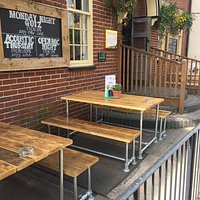 Great seating out front to watch the world go by!