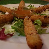 Fotos de burrito de pollo, tacos de pastor y nachos gringo