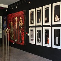 A glimpse inside the gallery at some of the artwork on display.