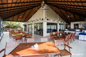 U Tan Sea Resort in Dongri, image may contain: Restaurant, Cafeteria, Dining Table, Table