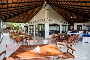 U Tan Sea Resort in Dongri, image may contain: Restaurant, Cafeteria, Dining Table, Table