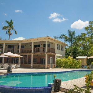 Black Orchid Resort in Burrell Boom, image may contain: Hotel, Resort, Villa, Chair