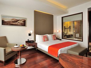 Anya Hotel & Resort in Gurugram (Gurgaon), image may contain: Corner, Furniture, Interior Design, Cushion