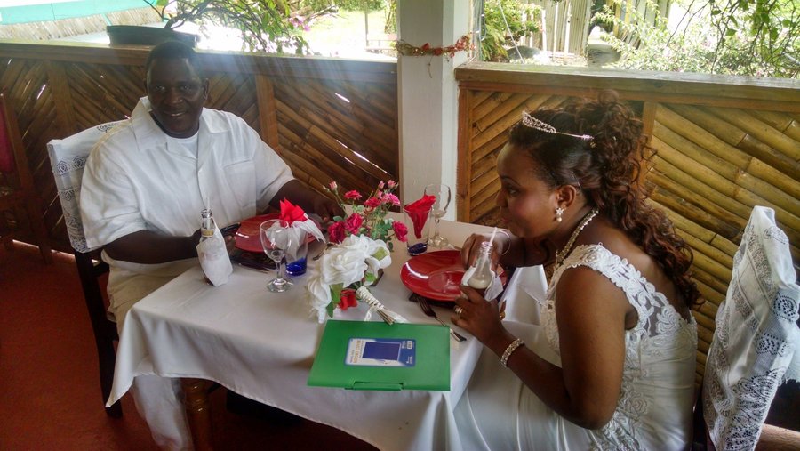 Newly wed couple at reception at Le Petit Paradis. 