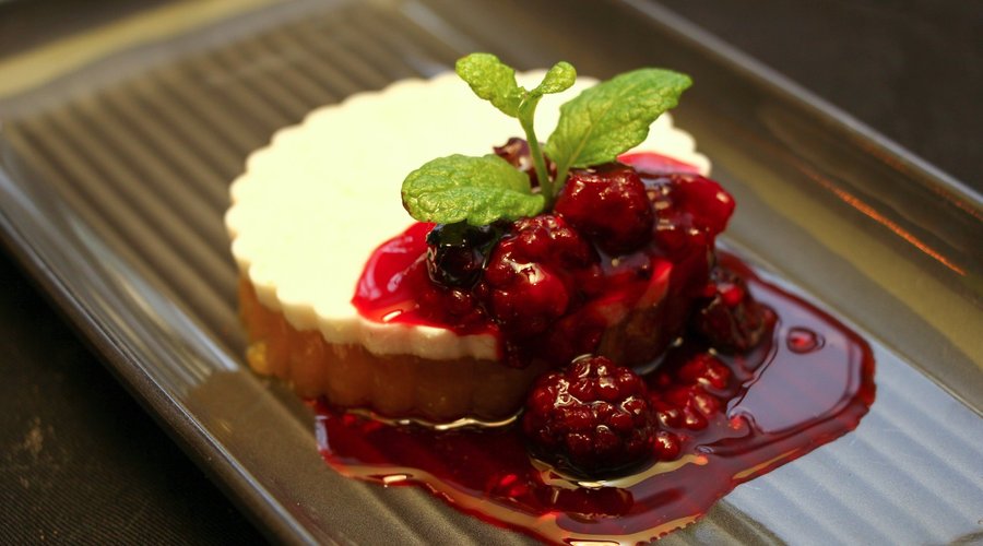 Mango and Coconut Layered Dessert with Berry compote