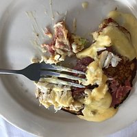 Hoecake topped with ham, crab, and hollandaise.
