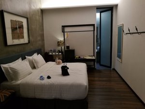 Merton Hotel in Ipoh, image may contain: Bed, Furniture, Handbag, Bedroom