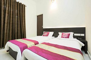 Hotel Prathiba Heritage in Thiruvananthapuram (Trivandrum), image may contain: Interior Design, Cushion, Home Decor, Furniture
