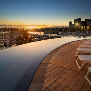 Infinity-edge pool at sunset