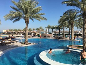 Al Bander Hotel & Resort in Sitrah, image may contain: Hotel, Resort, Pool, Summer