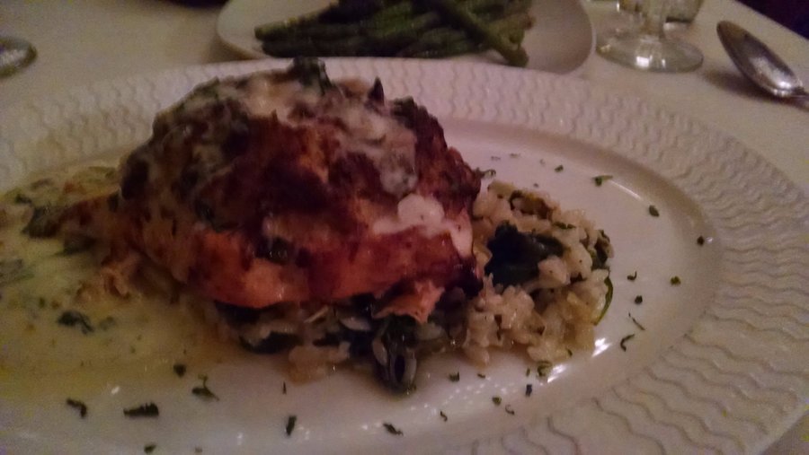 Salmon stuffed with crab imperial over a bed of spinach, artichoke risotto - $36.95