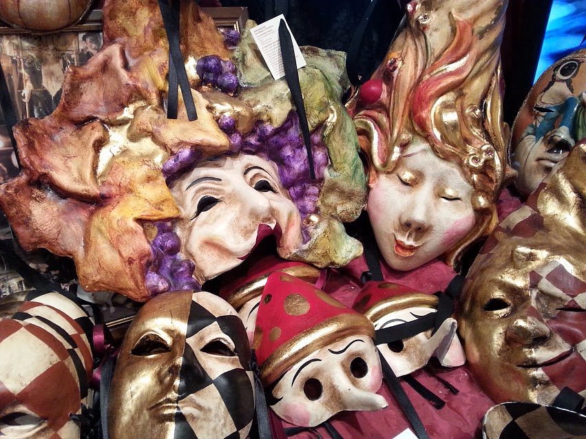 Big sun gold and silver, big carnival mask. Typical Venetian carnival masks,  vintage. Masks on display in Venice, Italy. Stock Photo