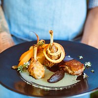 Half duck; breast is smoked, leg and thigh is confit, wing is crumbed