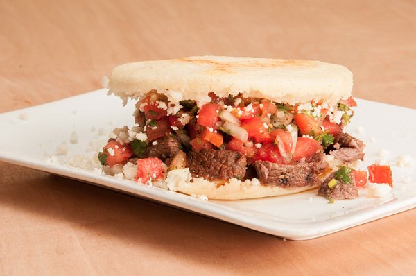 https://dynamic-media-cdn.tripadvisor.com/media/photo-o/0f/1d/1f/60/arepa-de-carne.jpg?w=600&h=-1&s=1