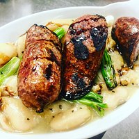 Local 8 Hands Farm Lamb Sausage over sautéed gigante beans