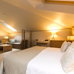 Art Hotel Kalelarga in Zadar, image may contain: Cushion, Home Decor, Bed, Lamp