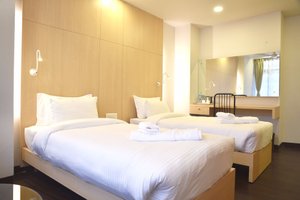 Ladybird Hotel in Shillong, image may contain: Furniture, Interior Design, Bed, Bedroom