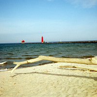 Lighthouse Beyond Grand Haven State Park's Sugary Beach
