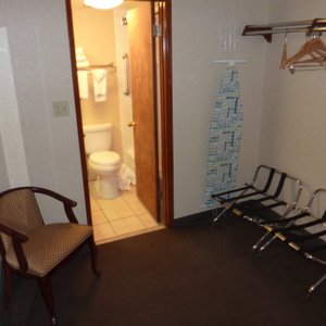 Large open closet area in front of the bathroom.