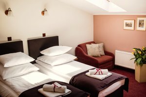 Eden Hotel in Krakow, image may contain: Cushion, Home Decor, Bed, Furniture