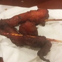 Idk what this is but its some kind of meat on a stick and it was very dry and hard.