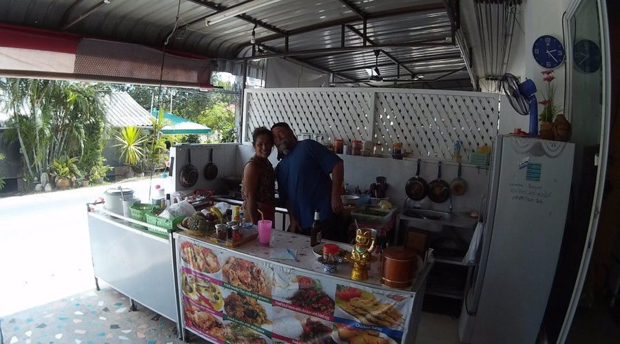Here is Yikky ~ with my husband Dave :)  Giving him cooking lessons ~  most delicious Thai food 