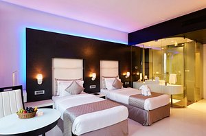 ESKAY Resorts in Mumbai, image may contain: Furniture, Home Decor, Hotel, Lighting