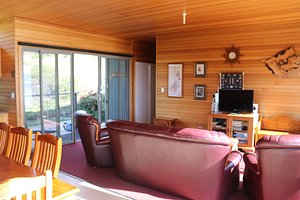 Captains Cabin in Bruny Island, image may contain: Interior Design, Monitor, Screen, Living Room